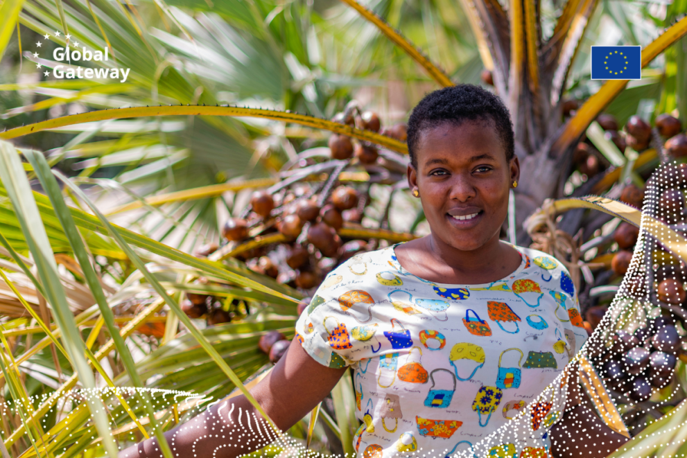 Woman in front of palm trees plantation